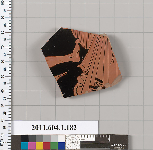 Terracotta fragment of a kylix (drinking cup)