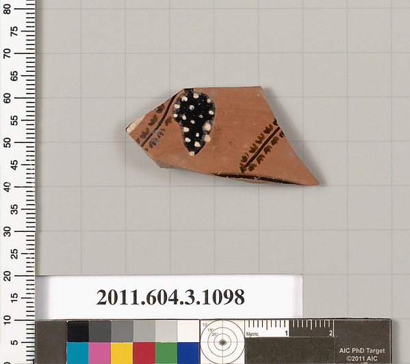 Terracotta fragment of a mastoid (drinking cup with narrow base) or a kyathos (cup-shaped ladle)