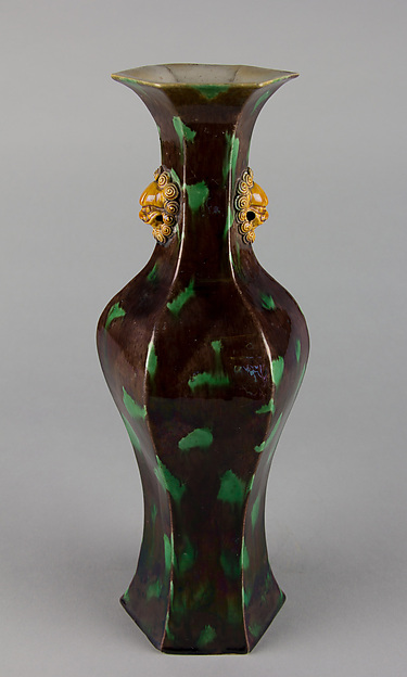 Hexagonal vase with lion-head handles